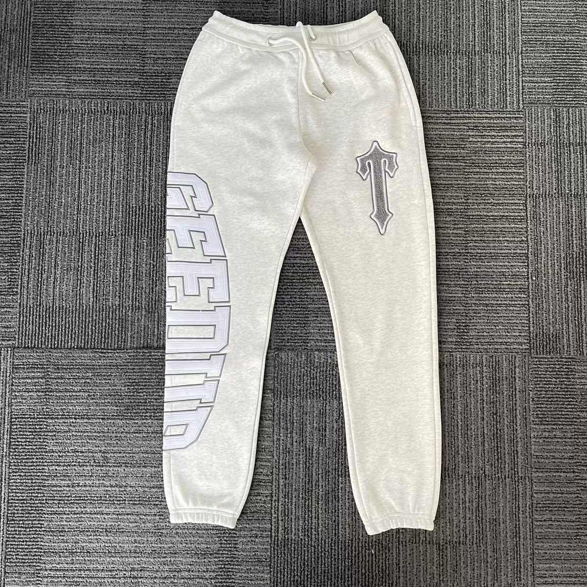 Geedup Off-White Vertical Lettering Cross Logo Sweatpants